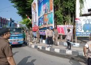 Gabungan 3 Pilar Kota Metro Bantu Bawaslu Tertibkan Alat Peraga Kampanye.
