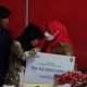 Walikota Bandar Lampung Serahkan Asuransi Kematian Rp42 Juta pada Ahli Waris