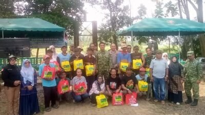 Kodim 0411/ KM Rehab Jembatan Gantung Merah Puti Di Taman Capit Urang.
